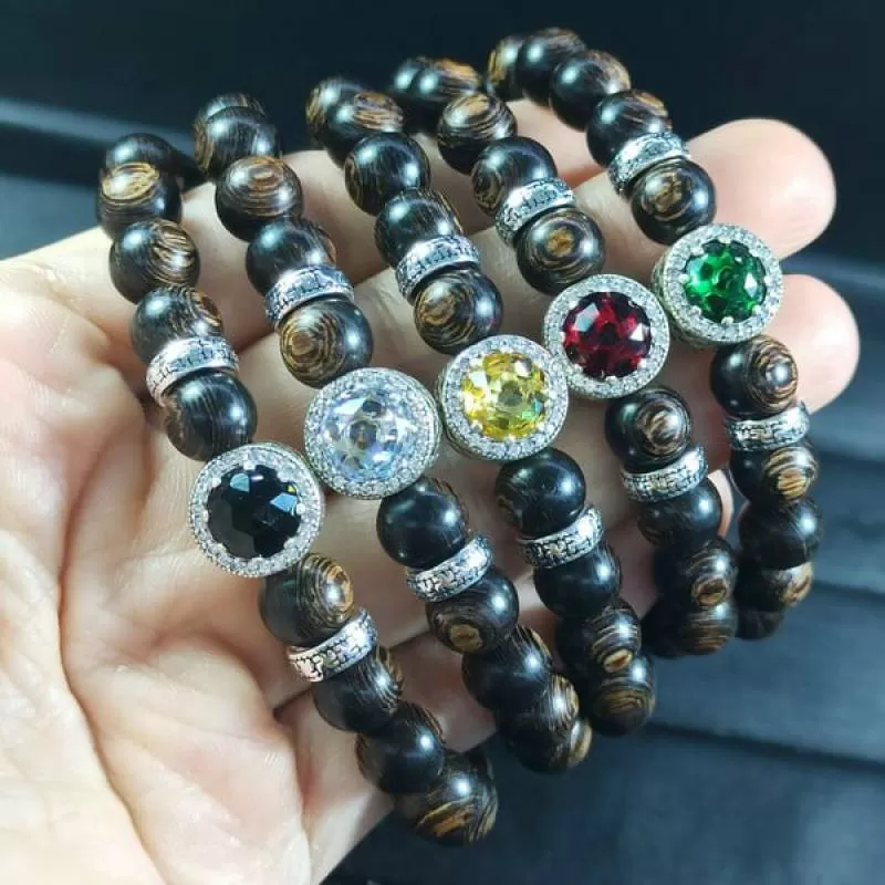 Vòng tay trầm hương sánh 8 mm mix charm pan bạc