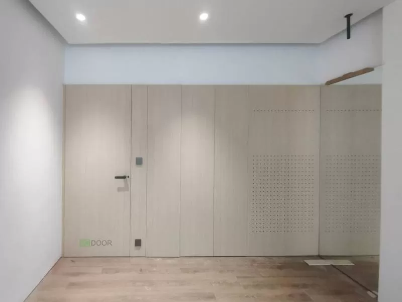 Cửa âm vách giấu khuôn Plywood Melamine 2340EV thi công tại 112 Trương Định